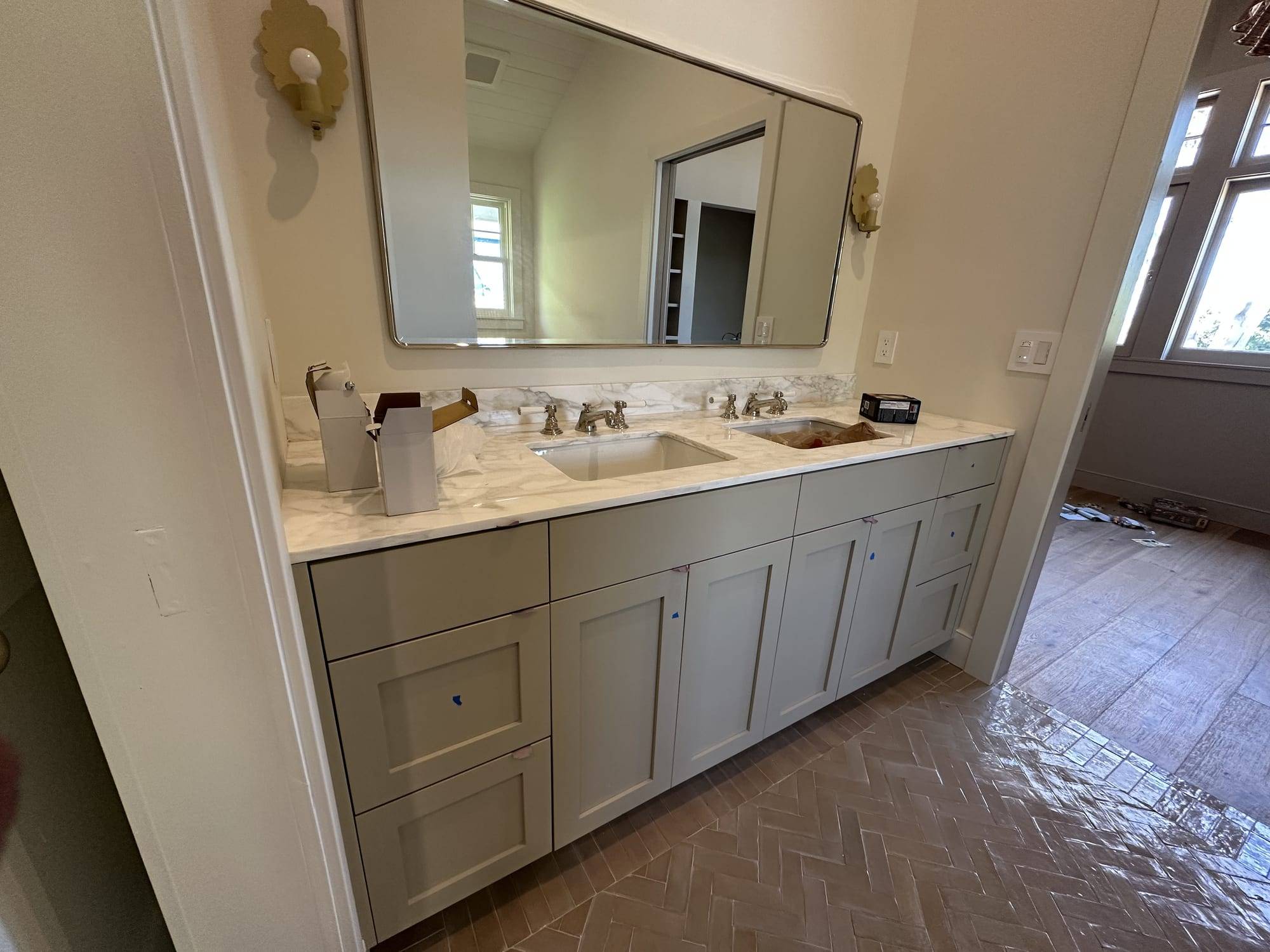 Gray painted double-sink bathroom vanity
