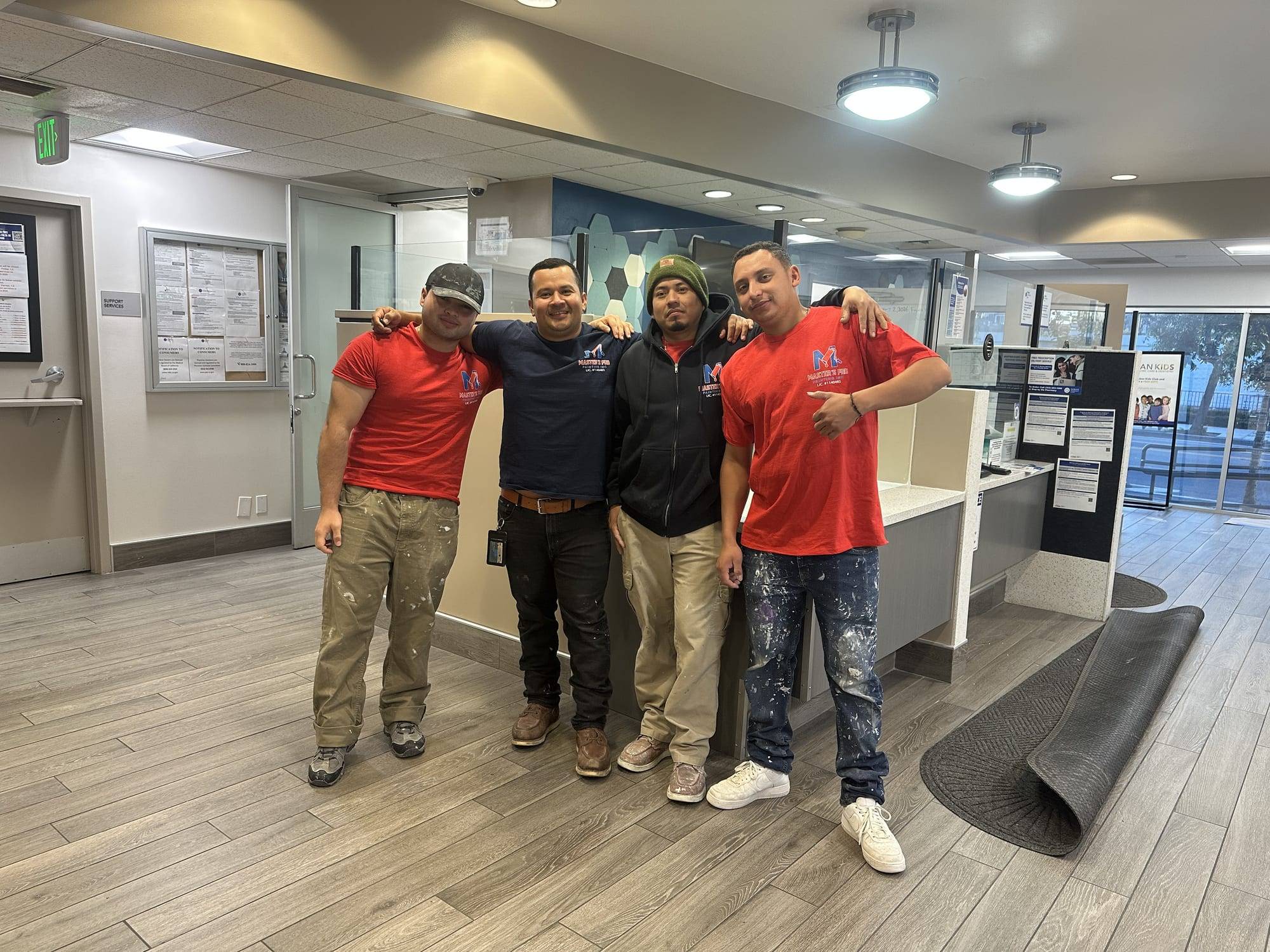 The Master's Pro Painting team at a paint store event