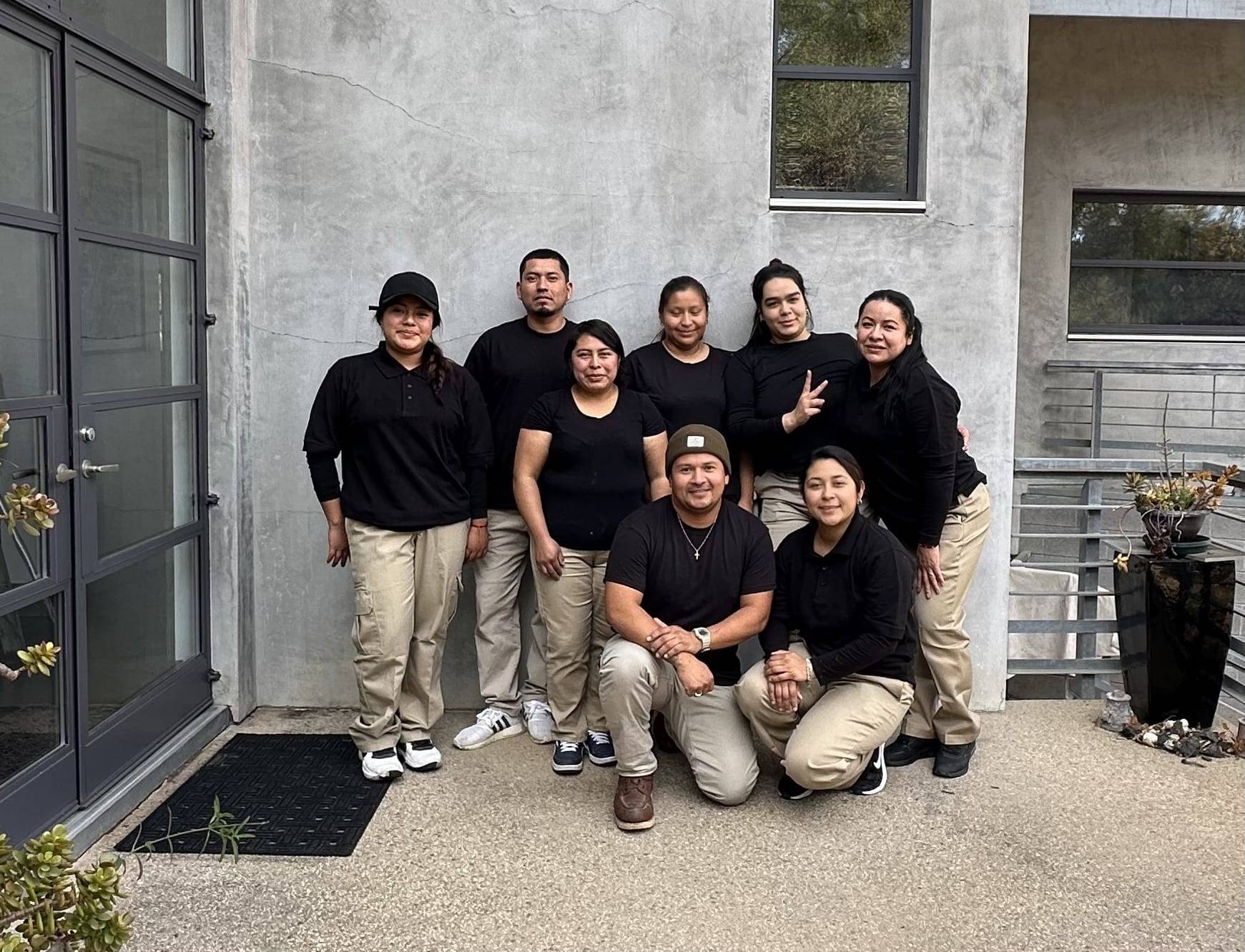 The Master's Pro Painting crew outside a building