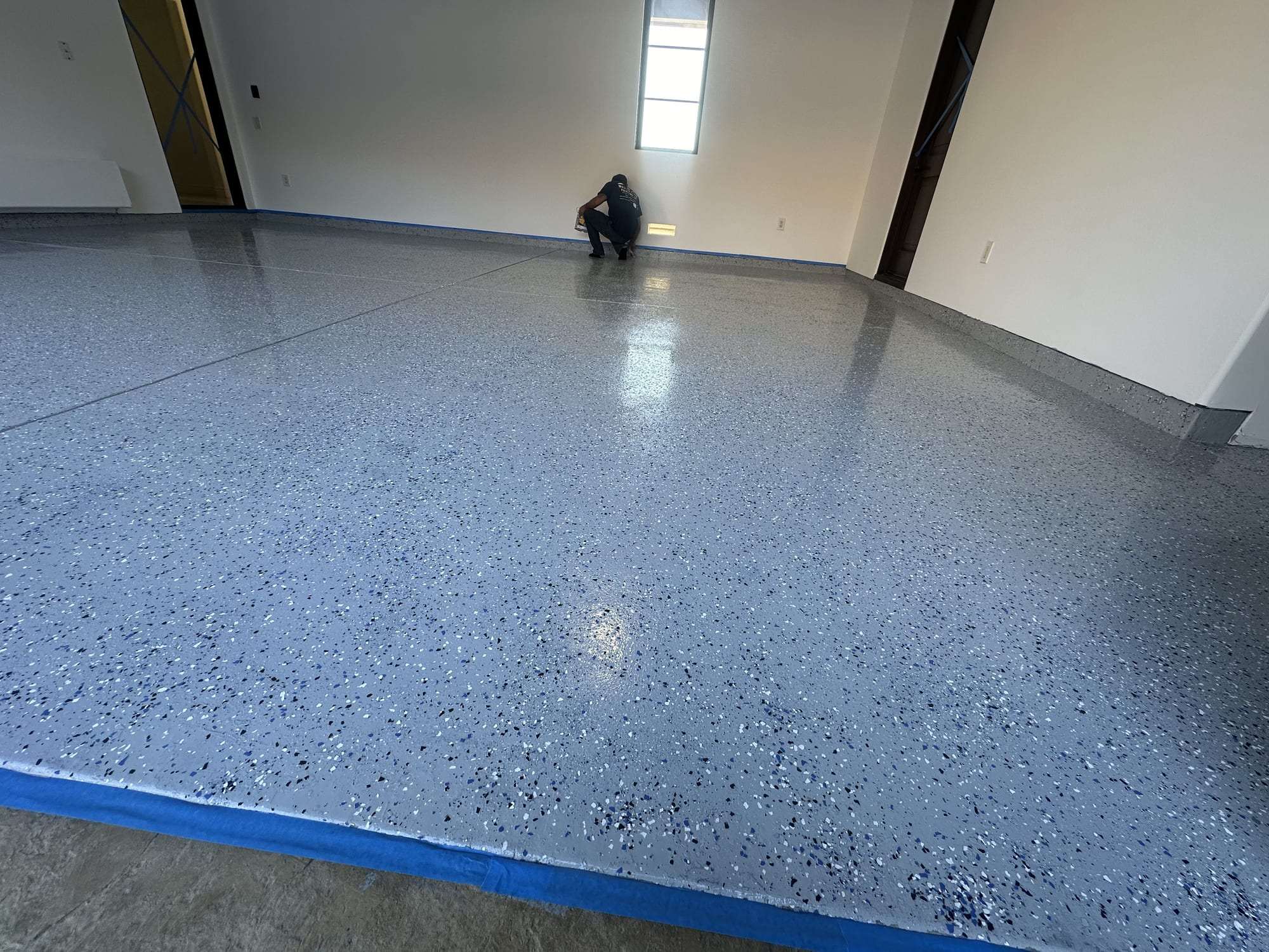 Gray flake epoxy garage floor, wide view